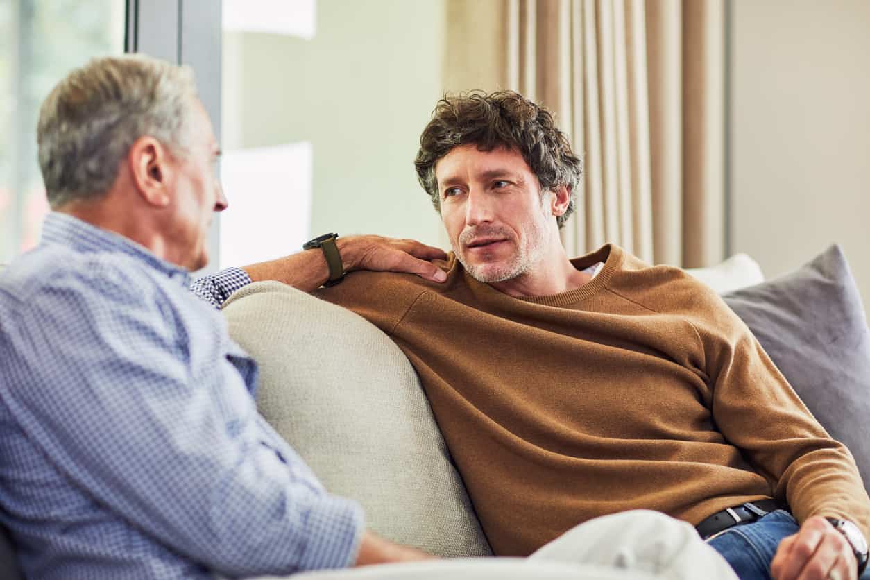 Father and son having a conversation