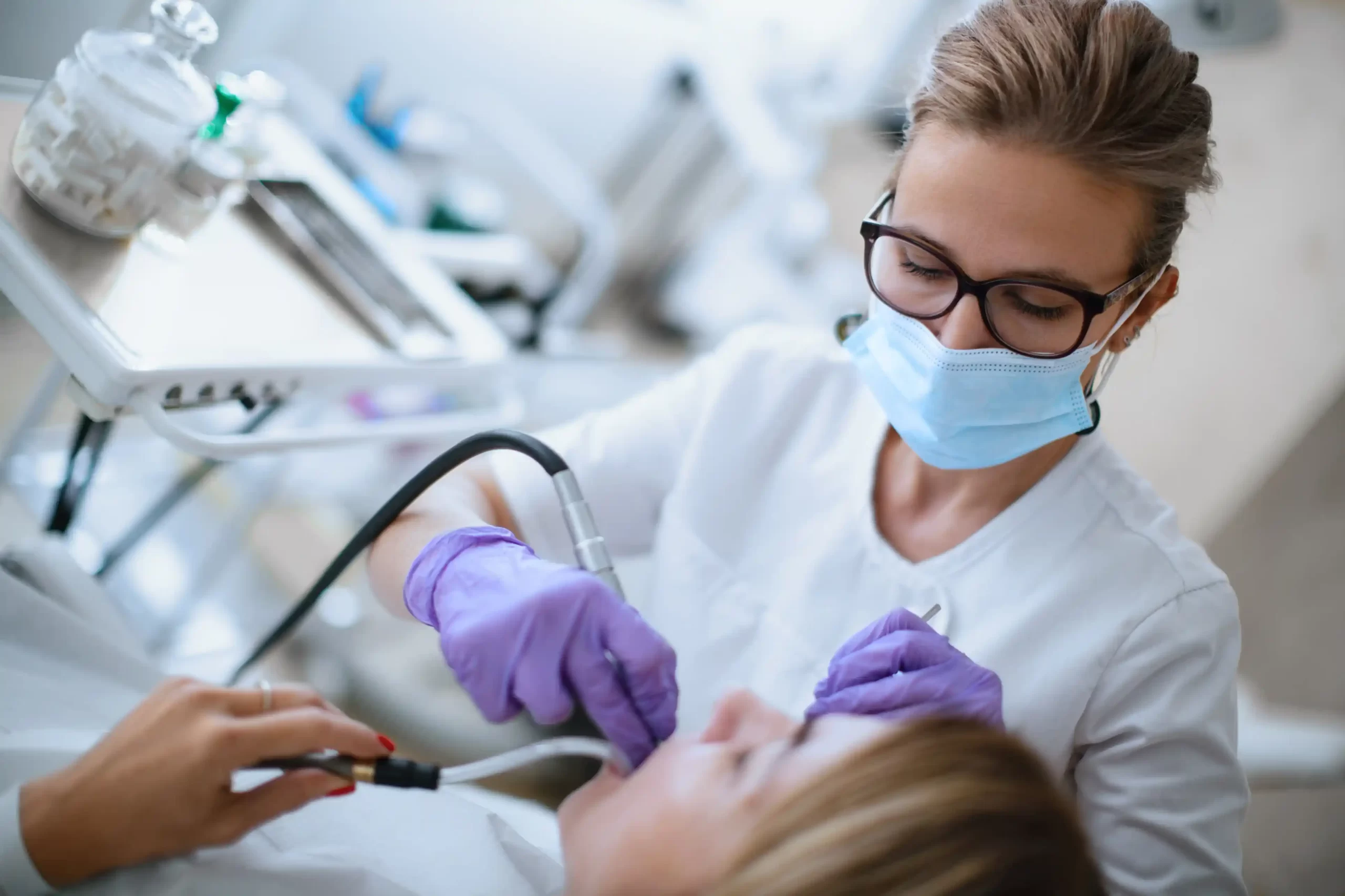 dentist fixing teeth